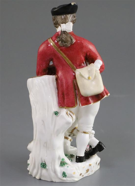 A Rockingham porcelain figure of a piping shepherd, c.1826-30, h. 18.5cm, some losses